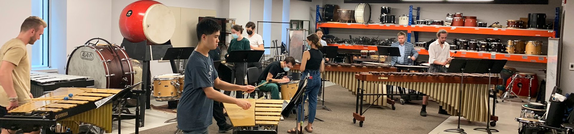 Students rehearsing in the percussion studio