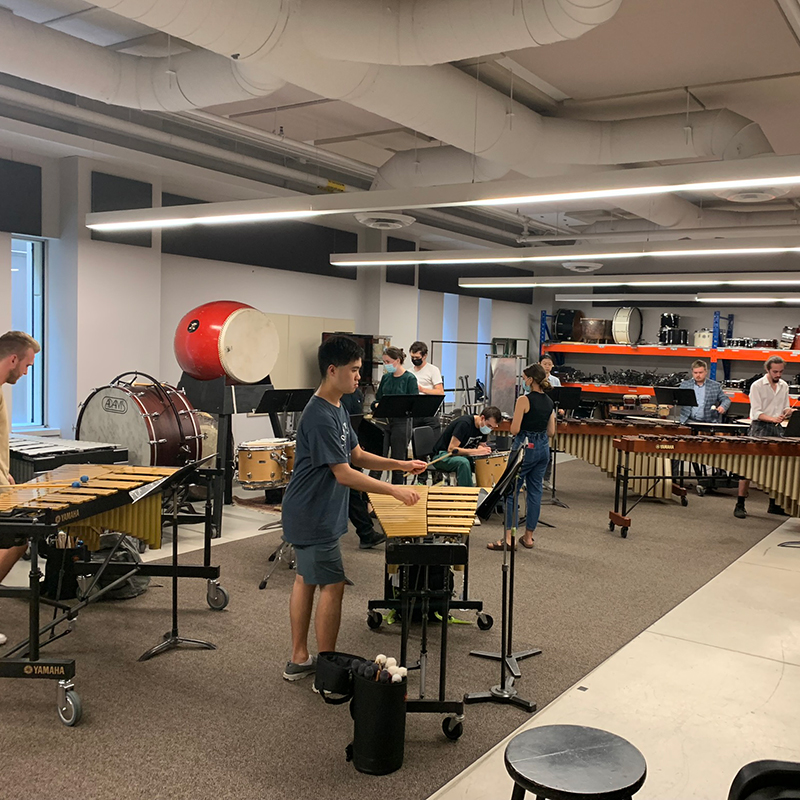 Students rehearsing in the percussion studio
