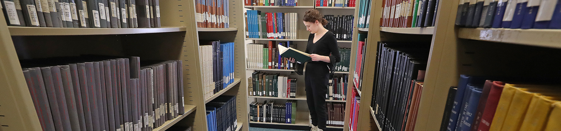A music student in the Music Library