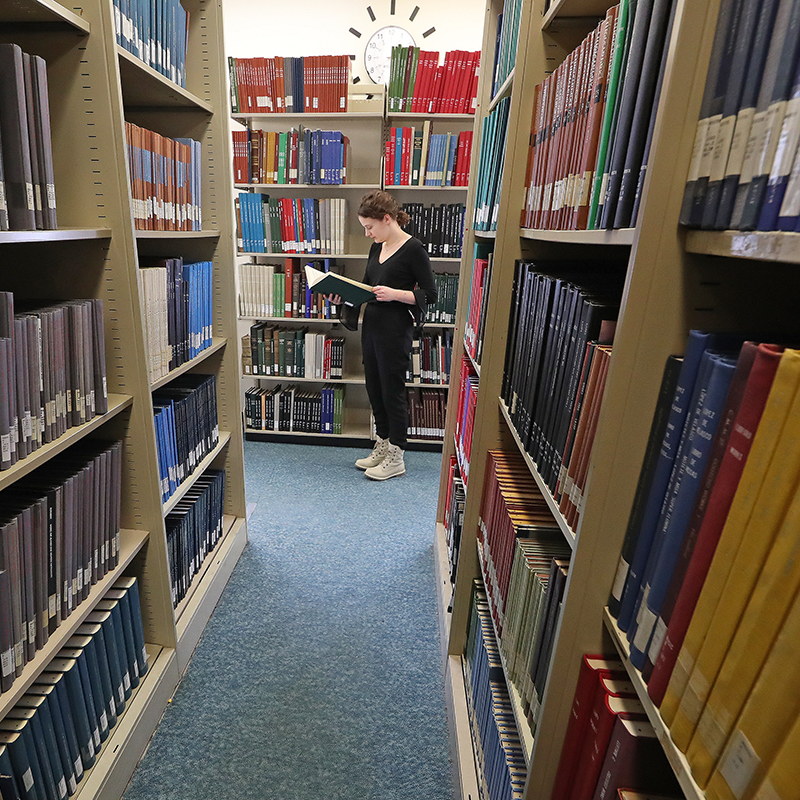A music student in the Music Library