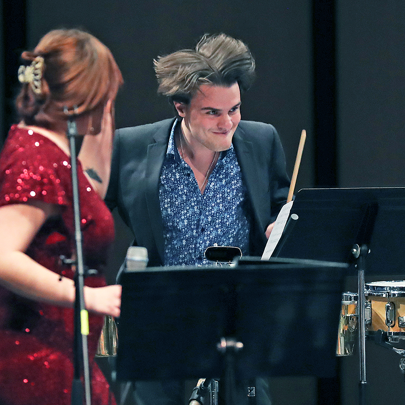 Student drummer performing in the Salsa Band
