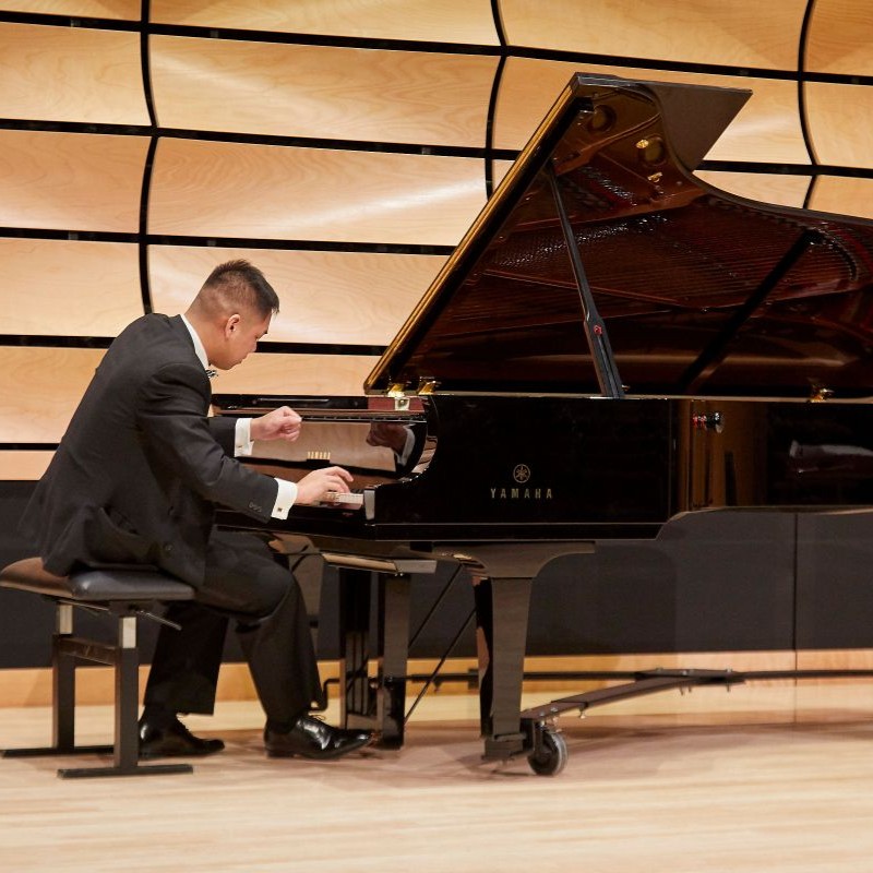 photo of student playing piano