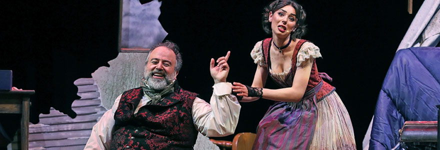 A maniacal, comic moment between (L to R) Sweeney Todd, played by music professor Chad Louwerse, and Mrs. Lovett, played by master's student Daria Kharchenko. (Claus Andersen/Don Wright Faculty of Music)
