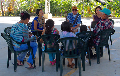 Ansari and Ocádiz lead a music workshop