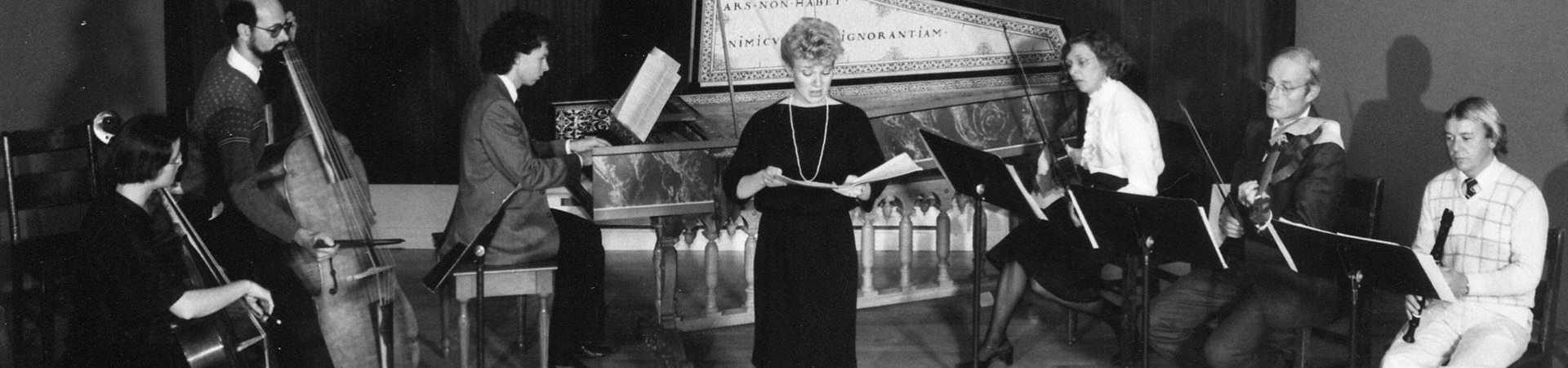 A black and while photo of an early music ensemble performing in 1983