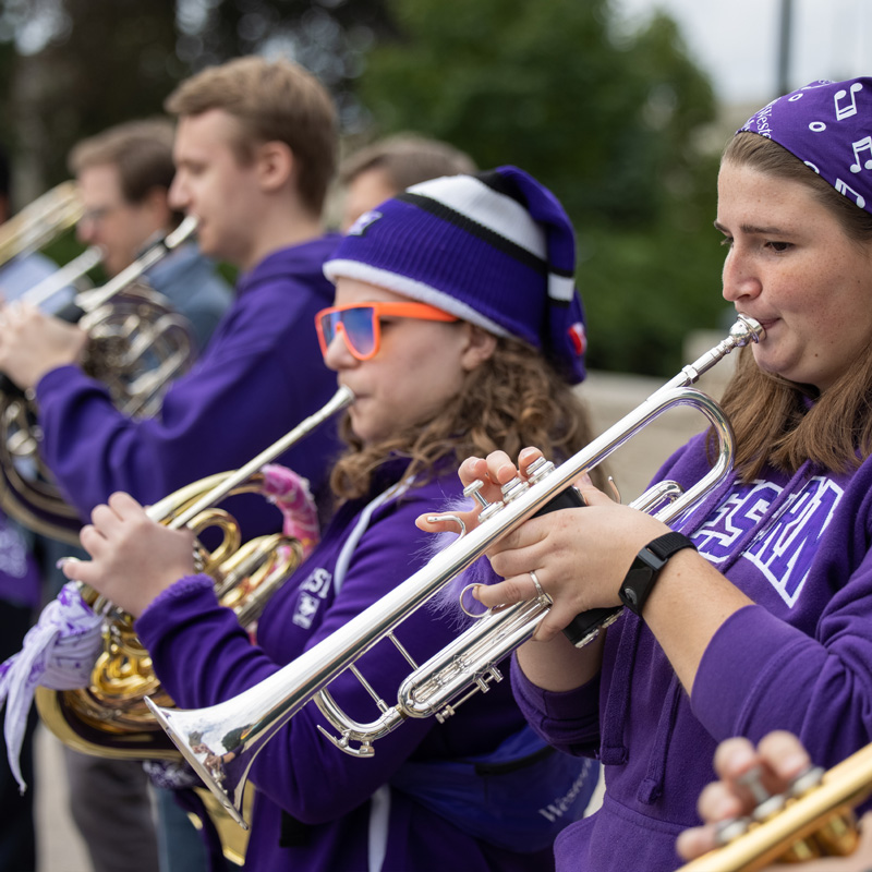 Student musicians performing outside