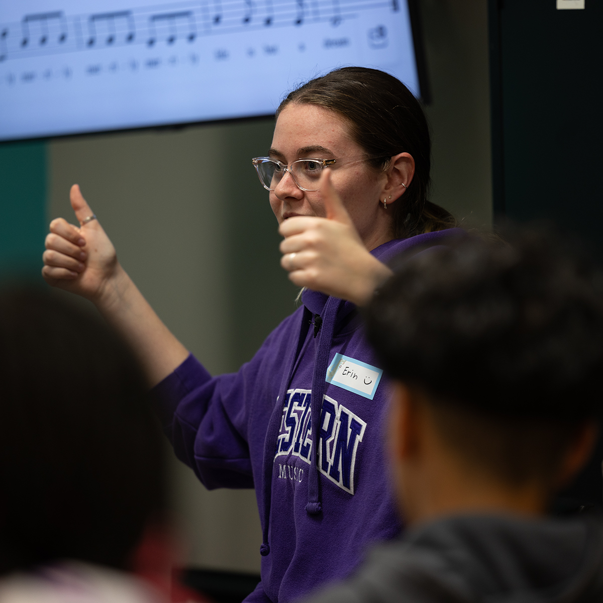 A Music Education student teaching a community music program
