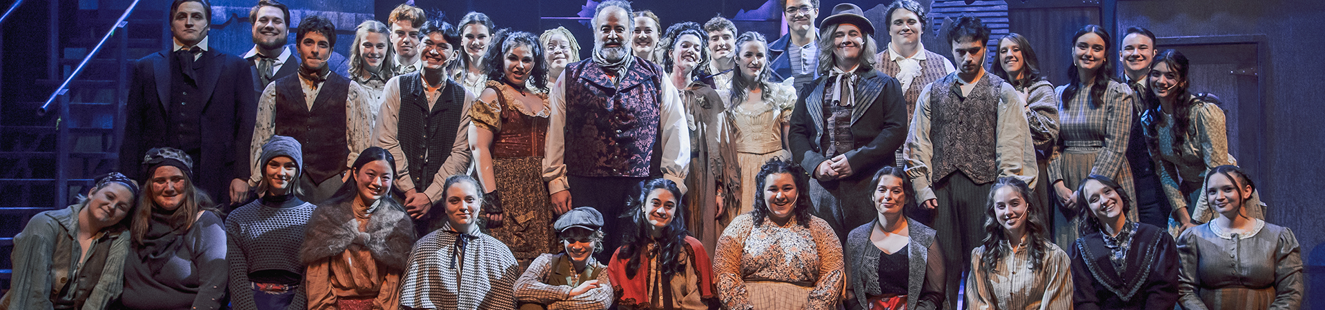 Opera cast members performing on stage