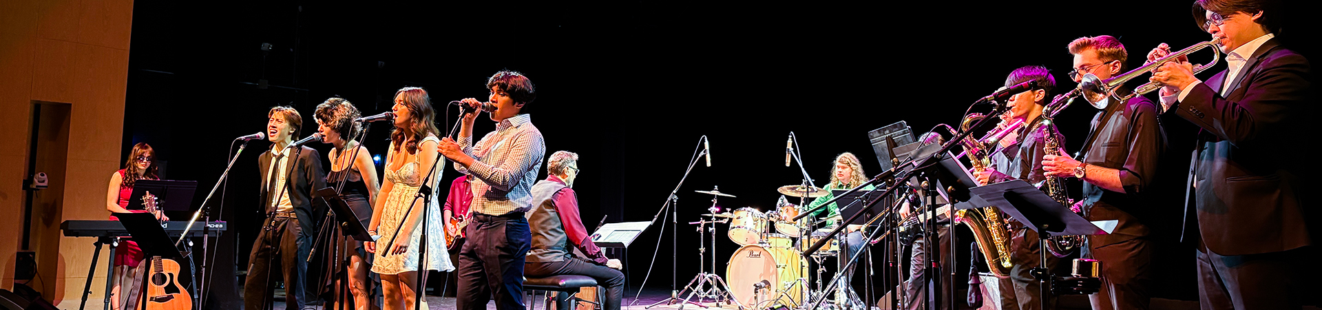 The Pop Band performs on stage in Paul Davenport Theatre