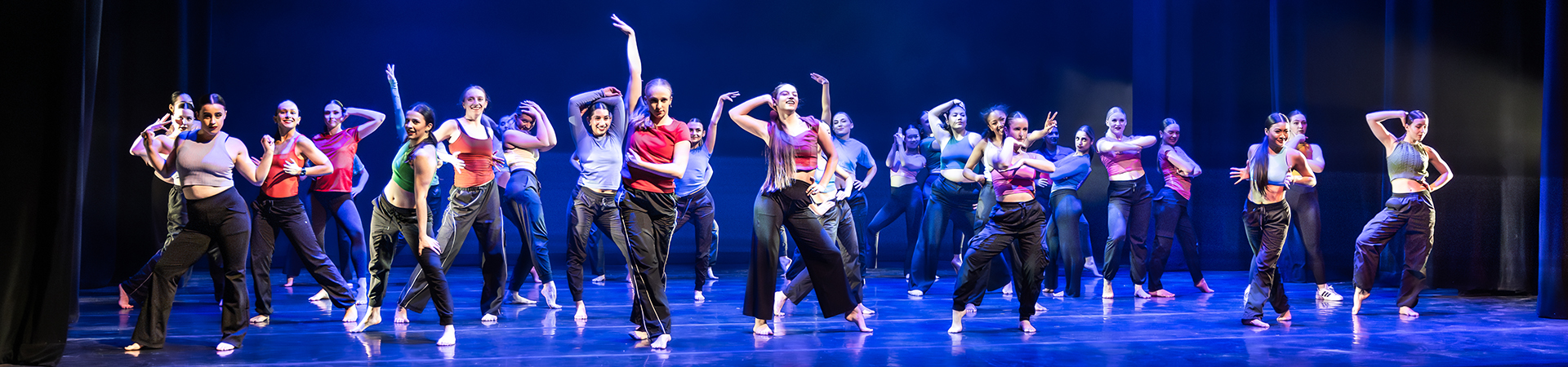 Dance Minor students performing on stage in Paul Davenport Theatre