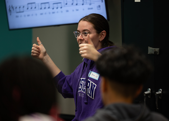 Music Education student leading a group of children