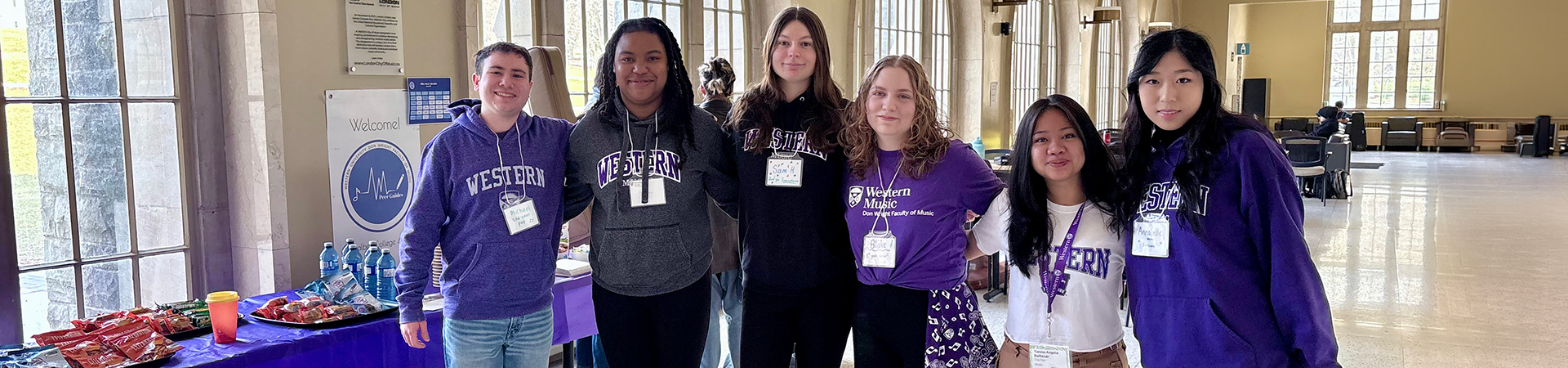 A row of friendly Music student volunteers
