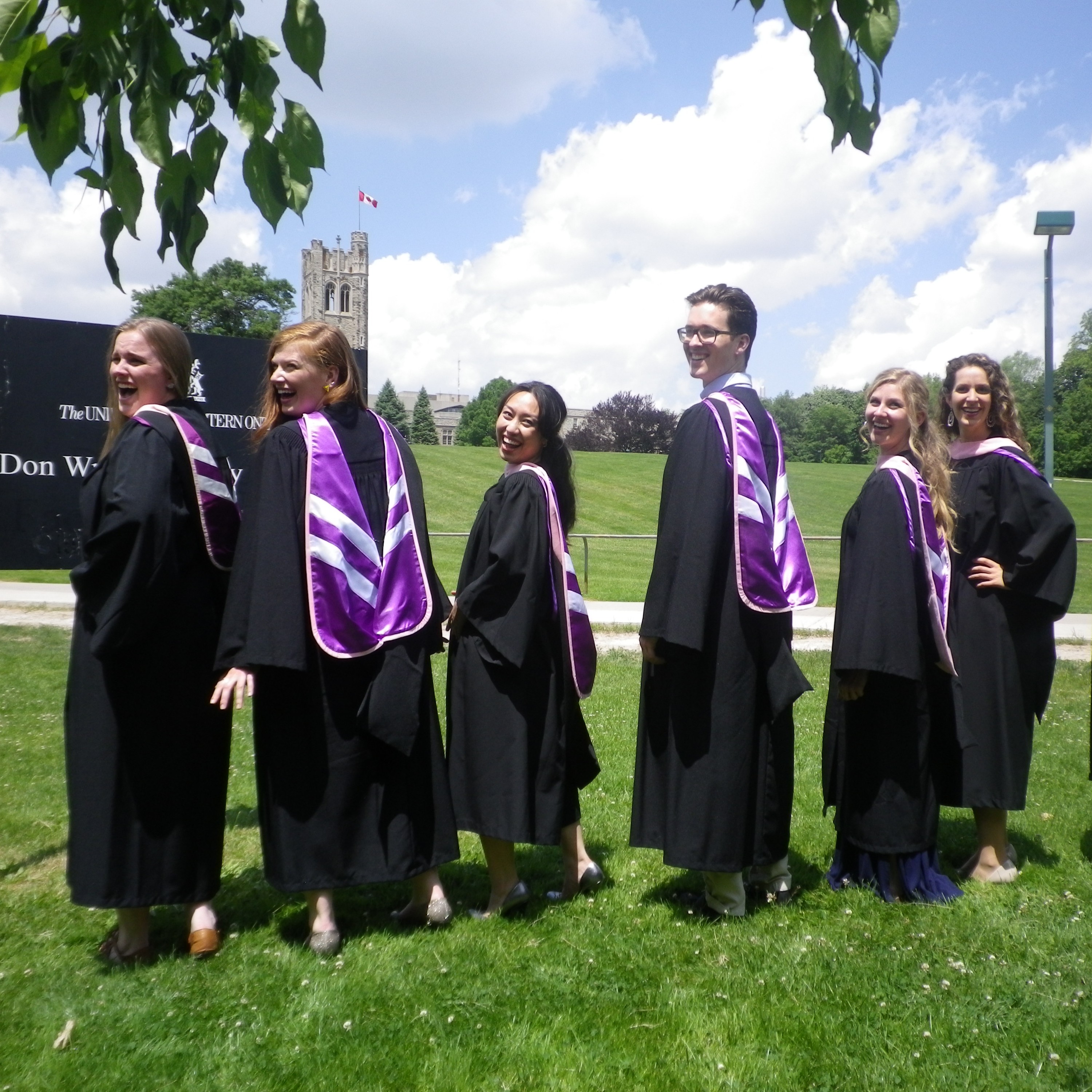 students with convocation regalia
