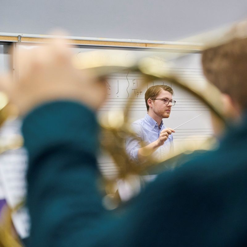 photo of student conducting