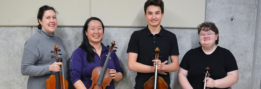(L to R): Master of music composition student Emily Hiemstra, viola professor Sharon Wei, first-year viola student Lincoln St. John and second-year viola student Cian Diamond. (Alexia Hlynialuk/Western Music)