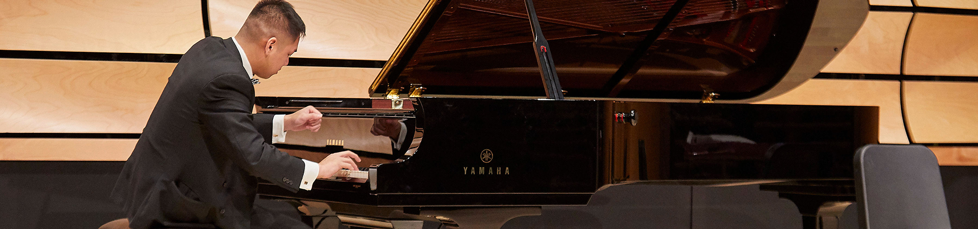 A piano student performing in von Kuster Hall