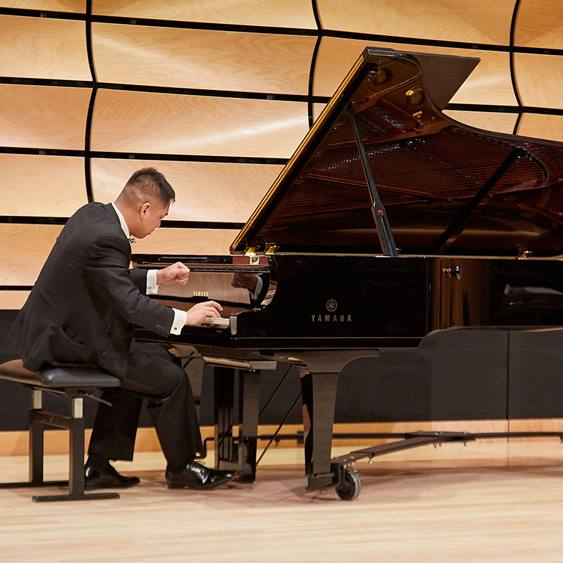 A piano student performing in von Kuster Hall