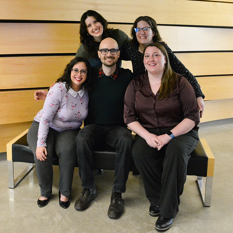 Five post-doctoral fellows in front of von Kuster Hall